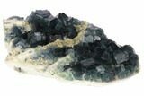 Cubic, Blue-Green Fluorite Crystals on Druzy Quartz - China #128871-2